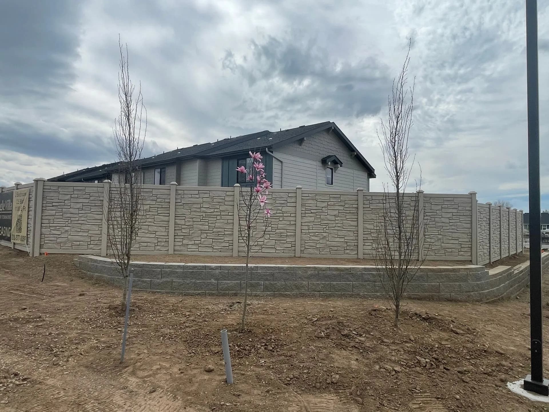 Secure and aesthetic sound-resistant fencing around the community perimeter